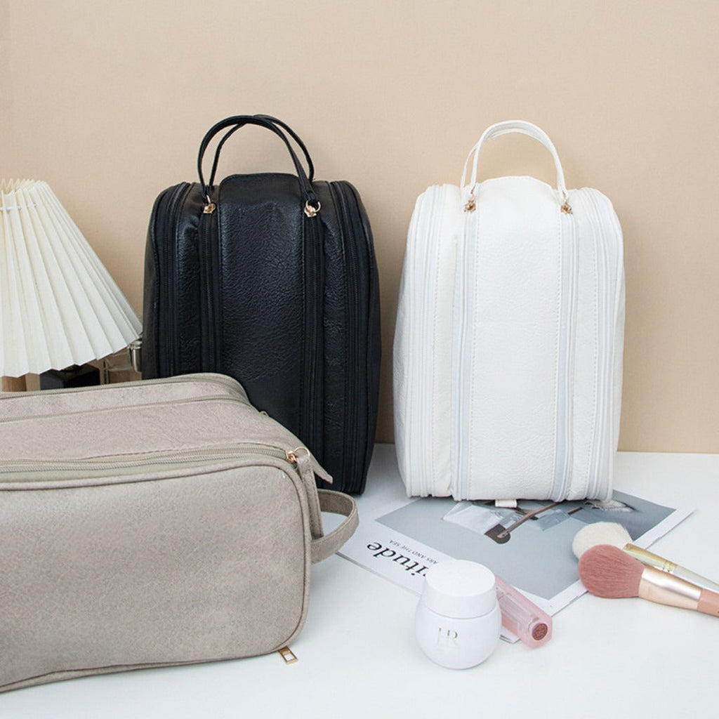Portable makeup bag with compartments for beauty essentials