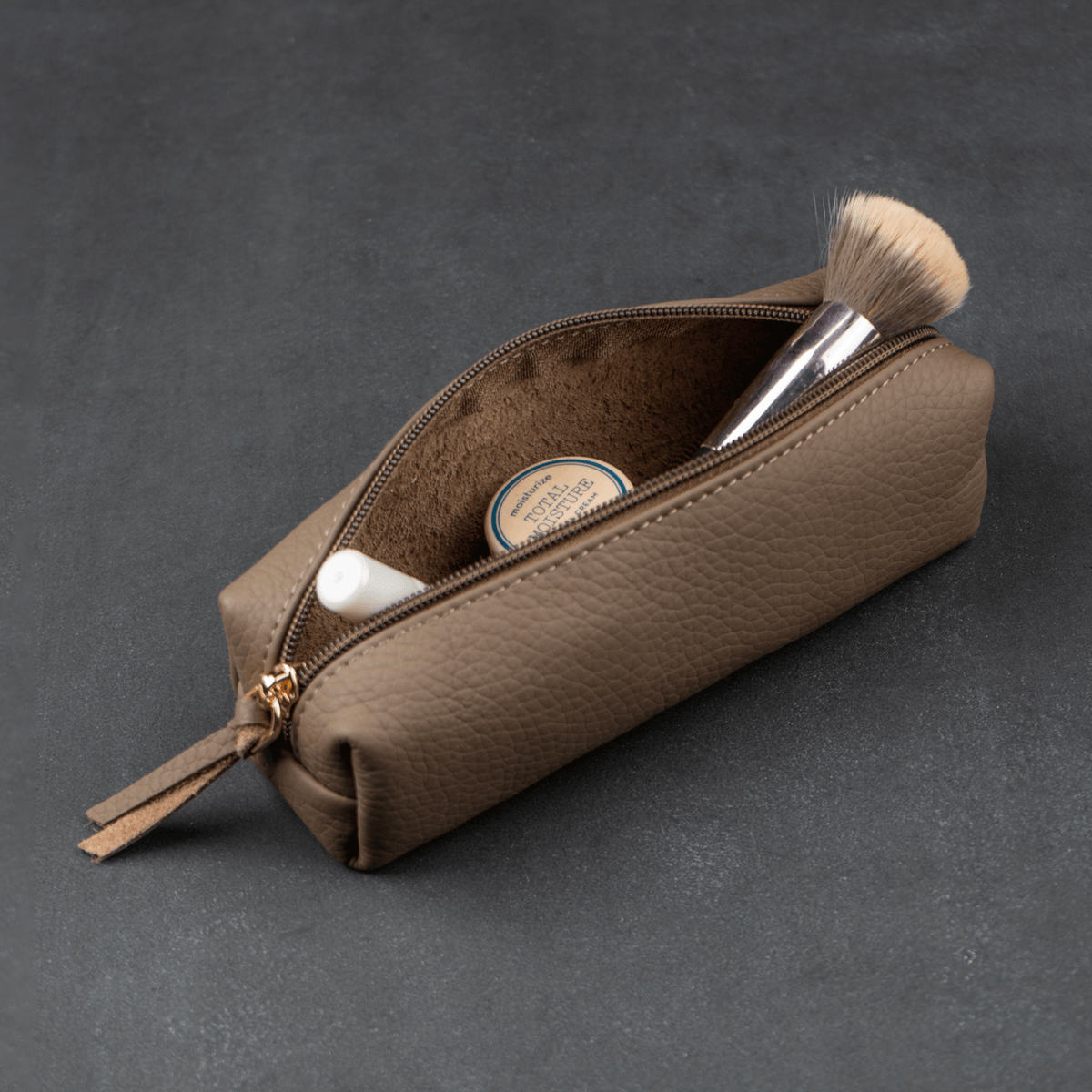 Aurora cream leather makeup bag detail