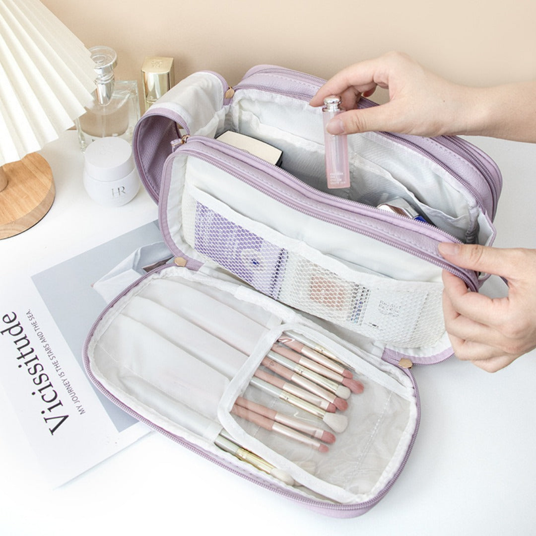 Large travel makeup organizer with divided interior
