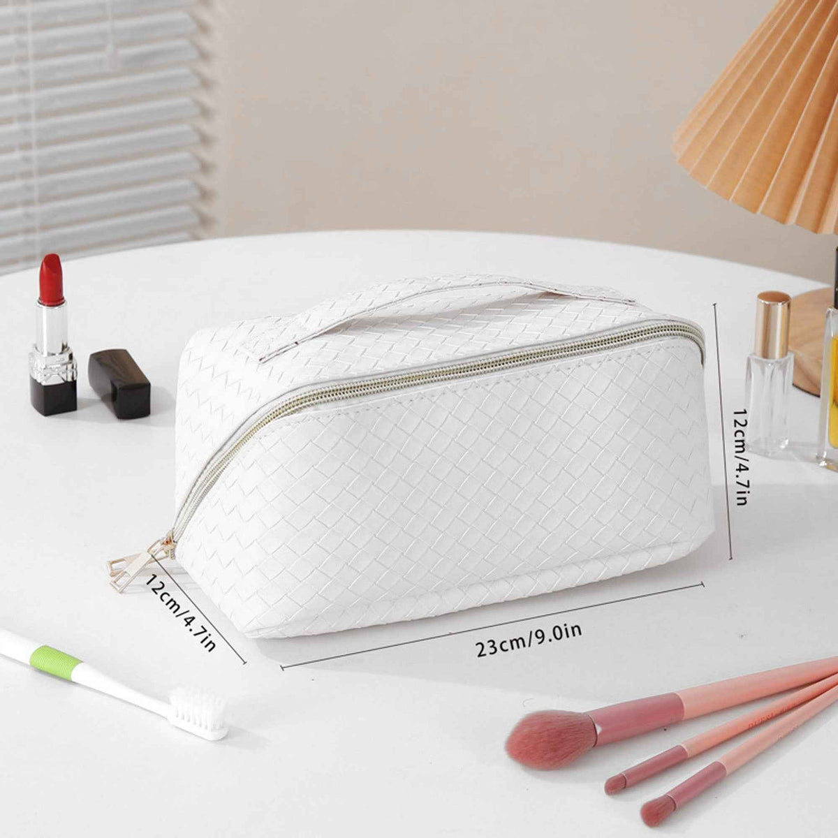 Travel makeup bag with brush storage — product view